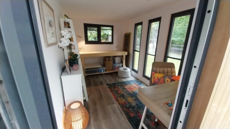 internal view of contemporary garden studio with composite decking