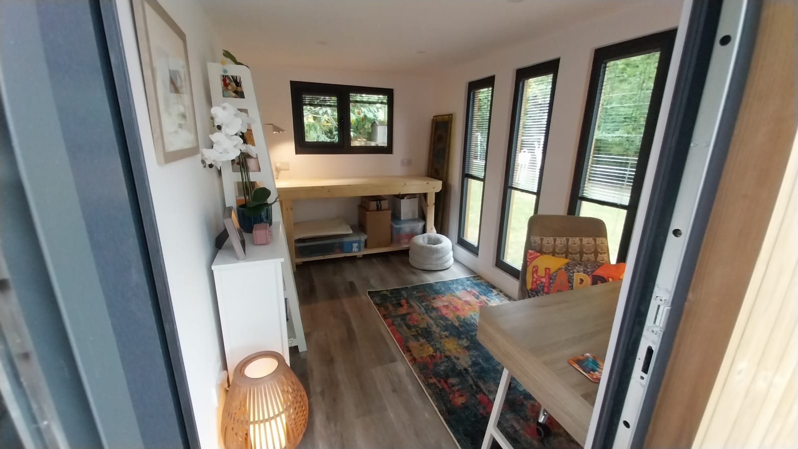 internal view of  contemporary garden studio with composite decking